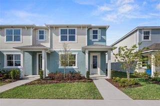 New construction Townhouse house 2489 Chickasaw Plum Loop, Clermont, FL 34711 Catalina II- photo 1