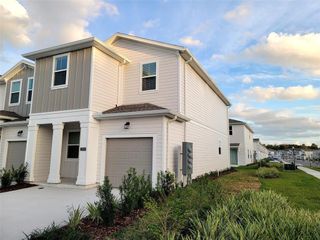 New construction Townhouse house 2305 Brook Marsh Loop, Kissimmee, FL 34747 Pampas- photo 1