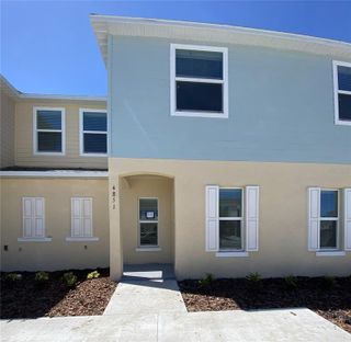 New construction Townhouse house 4851 Coral Castle Drive, Kissimmee, FL 34746 - photo 1