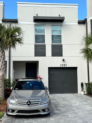 New construction Townhouse house 1757 Lindley Street, Mangonia Park, FL 33407 - photo 1