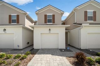 New construction Townhouse house 1031 Spring Palms Loop, Orlando, FL 32828 - photo