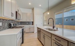 New construction Multi-Family house 5962 Rendezvous Pkwy, Timnath, CO 80547 Garden Series - Rosemary- photo