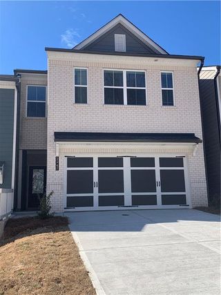 New construction Townhouse house 5247 Canberra Drive, Unit 60, Flowery Branch, GA 30542 Sawnee- photo 1