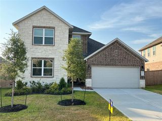 New construction Single-Family house 1064 Dancing Feather Street, Montgomery, TX 77356 Plan 2185- photo 1