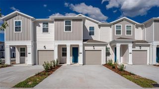 New construction Townhouse house 7521 Stone Creek Trail, Kissimmee, FL 34747 Pampas- photo 1