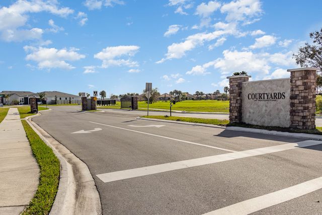 Courtyard at Waterstone by Adams Homes in Palm Bay - photo